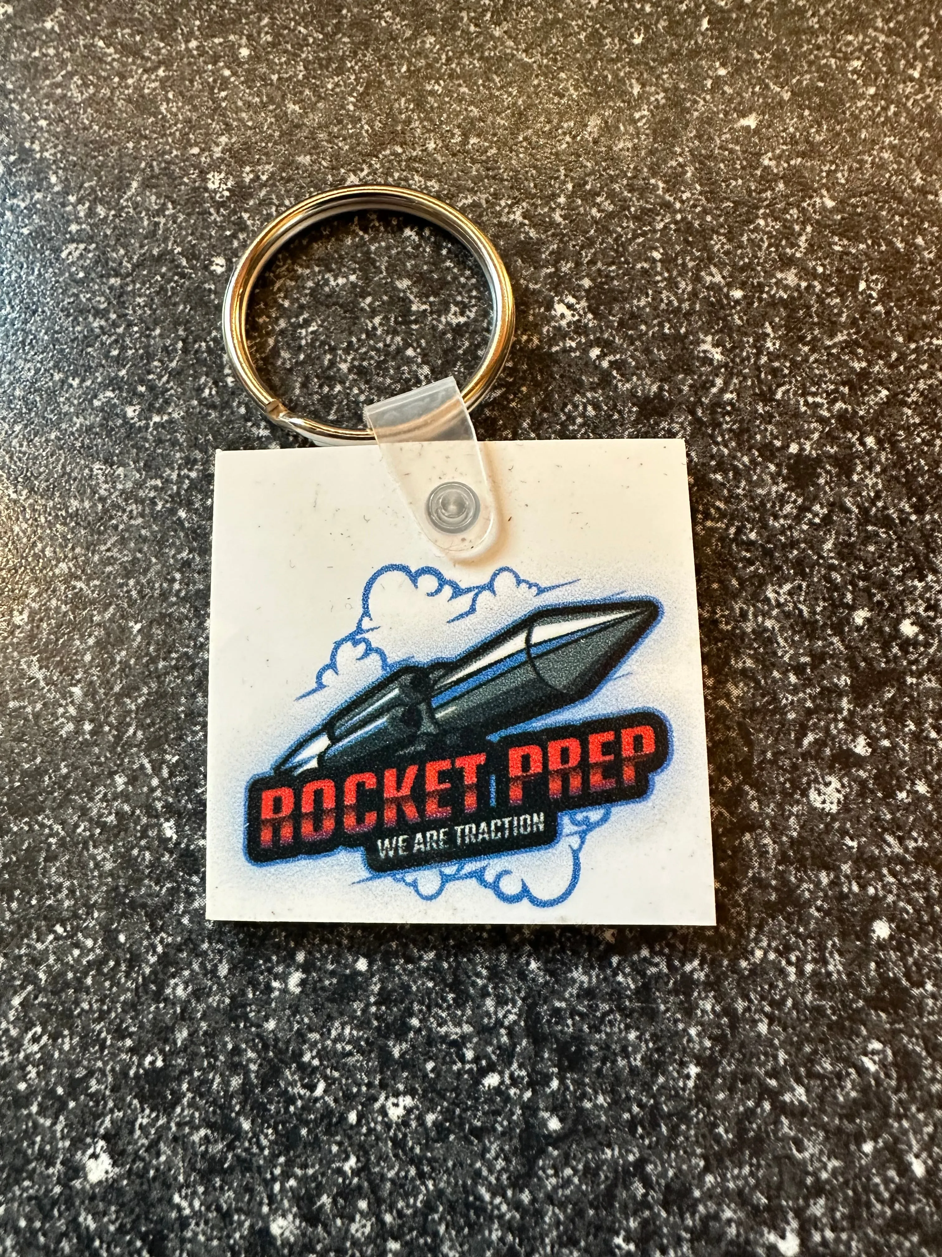 Rocket Track Glue Double Sided Keychain